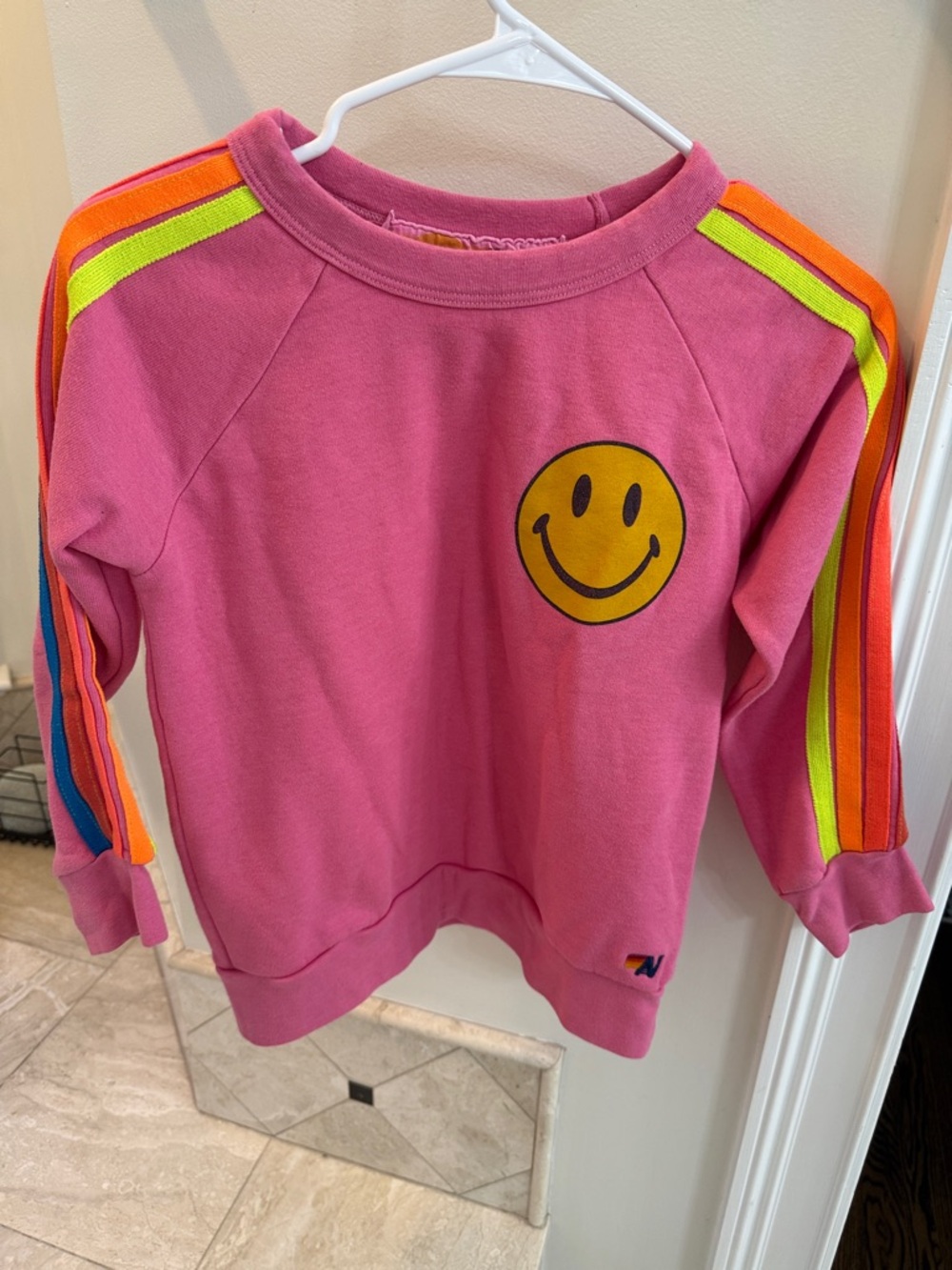 Aviator Nation Pink Sweatshirt with Yellow Smile and Neon Rainbow Stripes